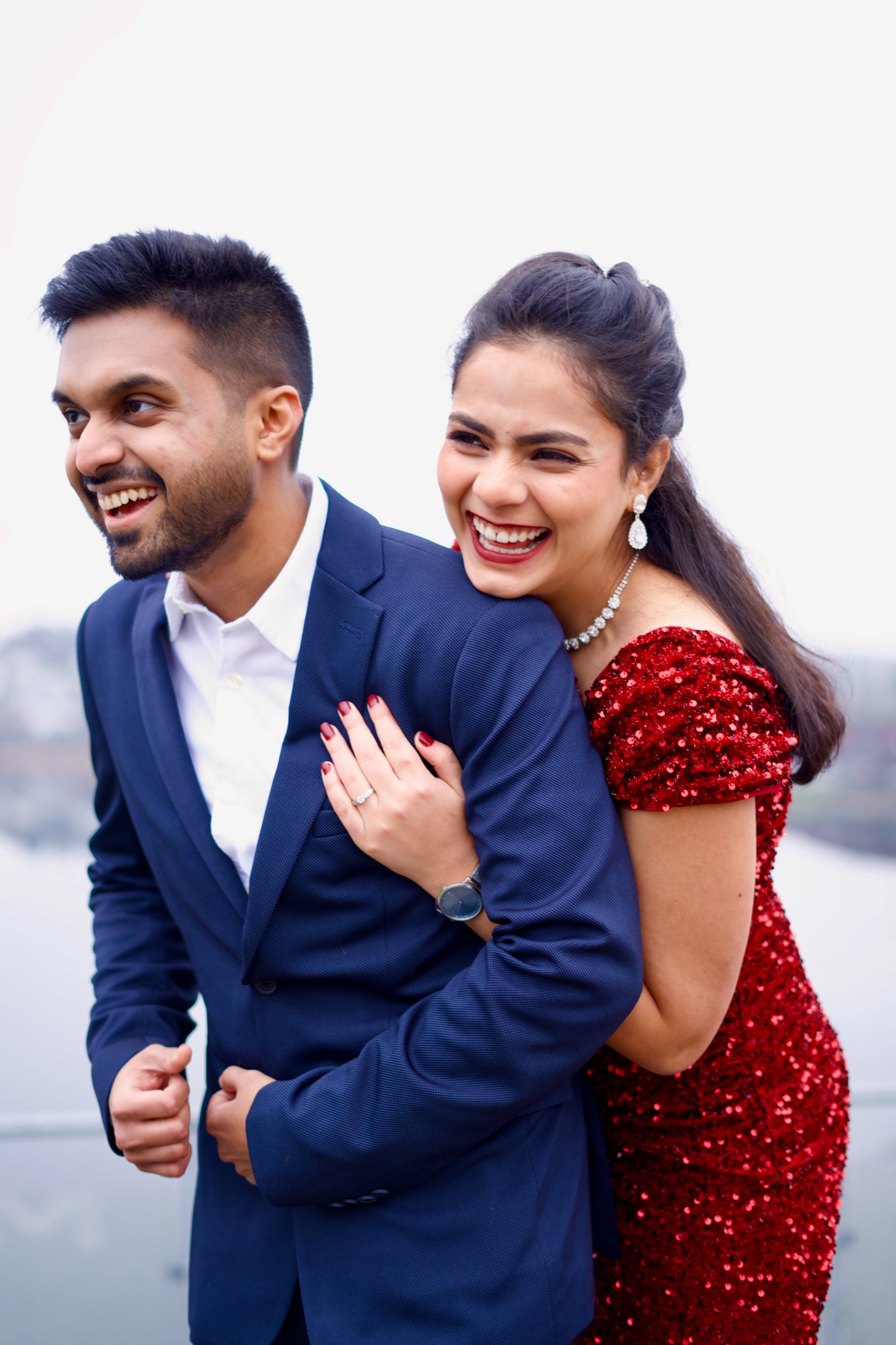 Couple laughing together in a close portrait